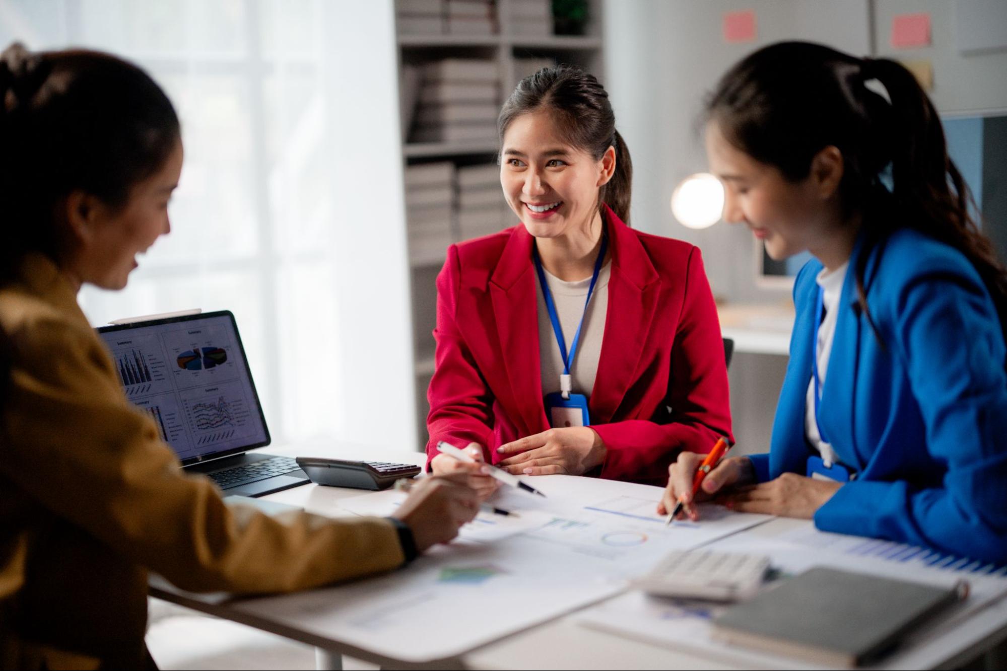 Insurers evaluating insurance eligibility and business risk during a strategy meeting
