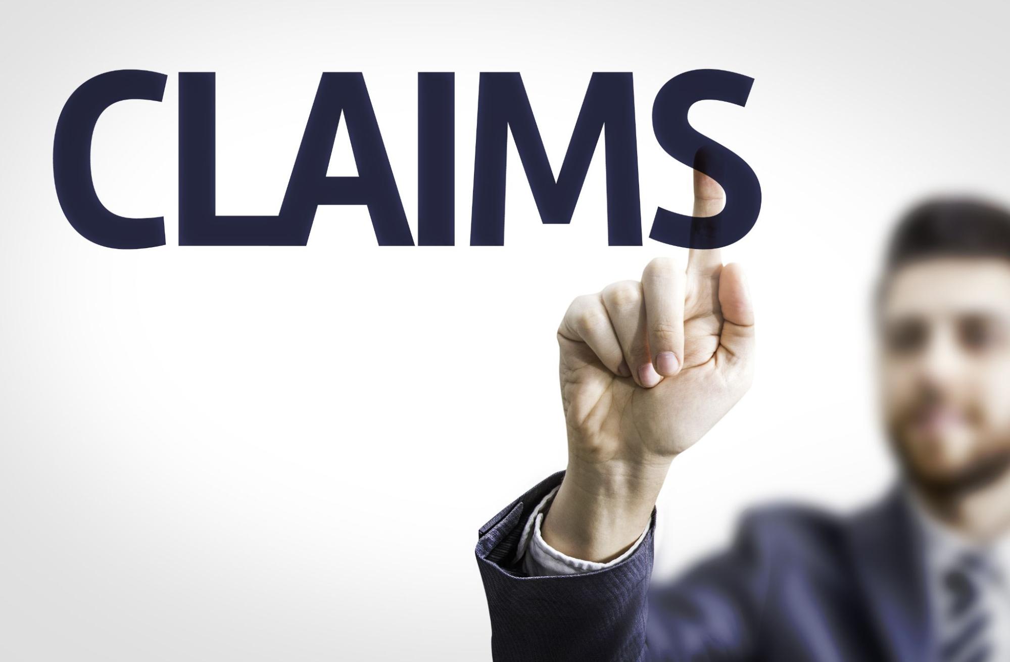 User interacting with a digital claims interface, illustrating analysis of loss runs and insurance claim records