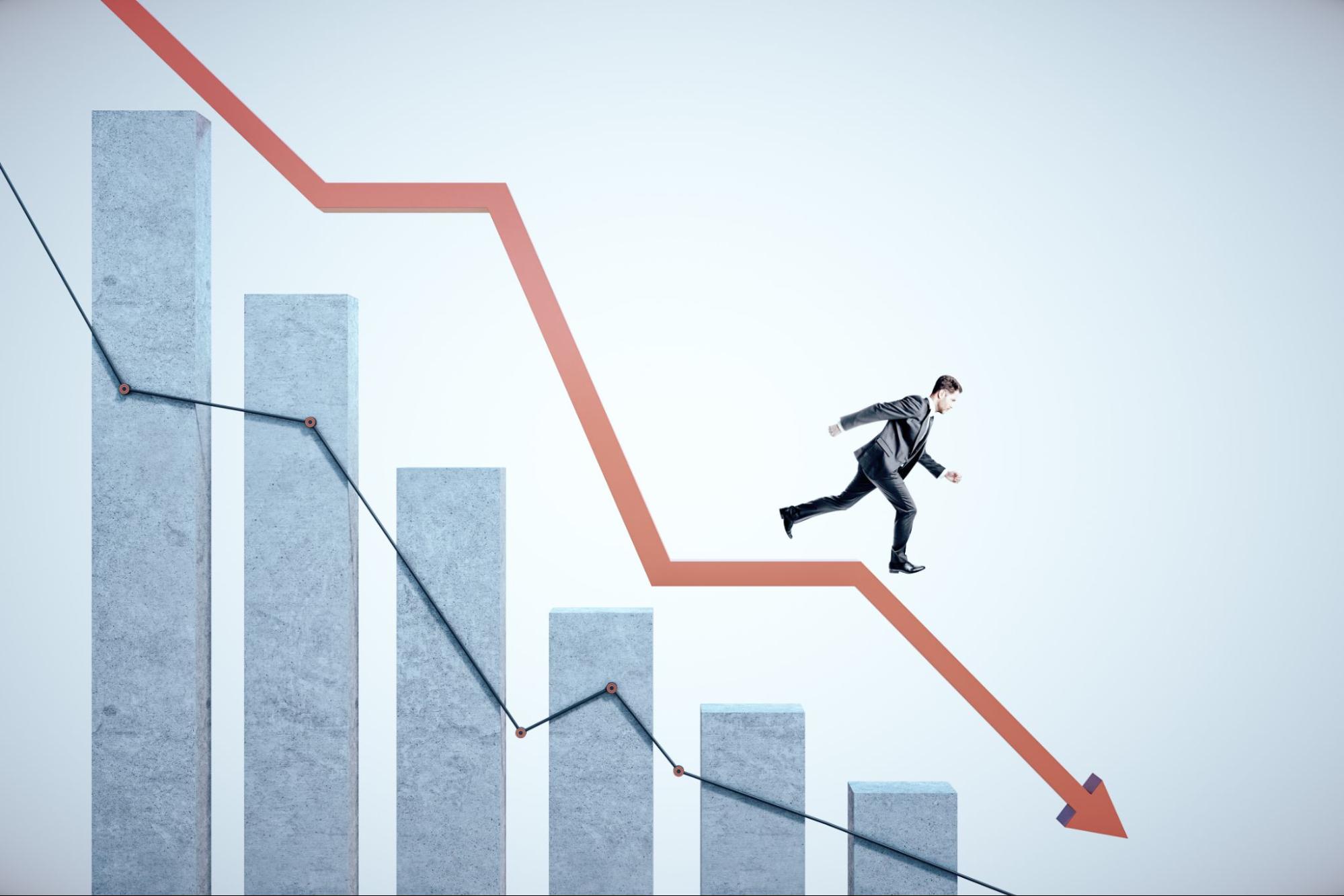 Figure descending a financial graph arrow, representing poor loss runs and increased claims in insurance records